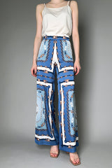 D. Exterior Chain Print Silky Twill Trousers in Blue and Bronze