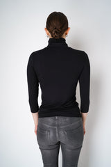 L'Agence Aja Turtleneck 3/4 Sleeve Viscose Top in Black Vancouver. Shop Online or in Store.