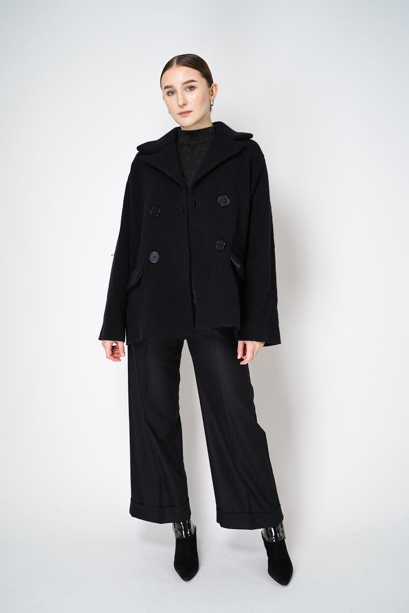 D. Exterior Wide Cropped Wool Flannel Trousers in Black Vancouver. Shop Online or in Store.