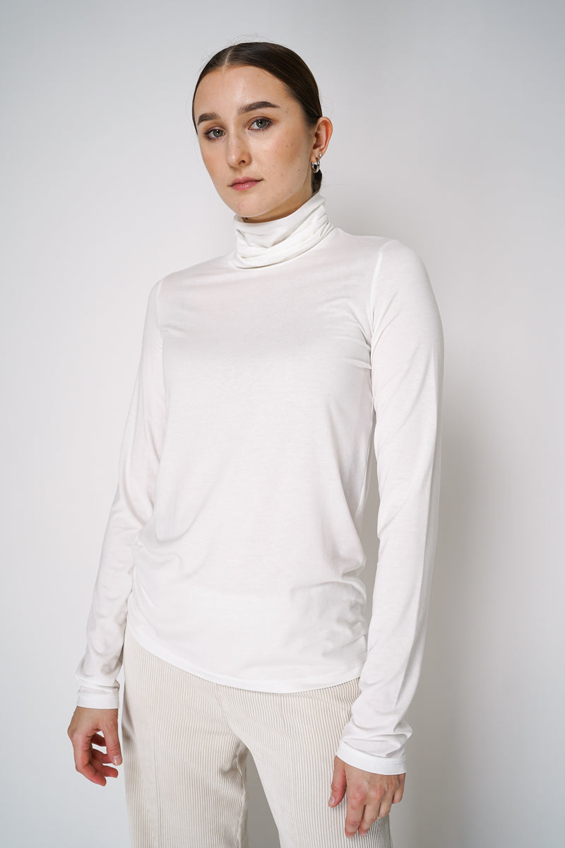 Peter O. Mahler Long Sleeve Turtleneck Jersey Pullover Top in White Vancouver. Shop Online or in Store.