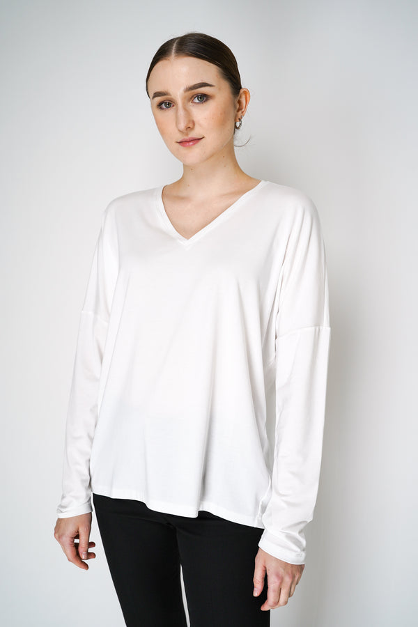 Peter O. Mahler Long Sleeve V-Neck Jersey Pullover Top in White Vancouver. Shop Online or in Store. 