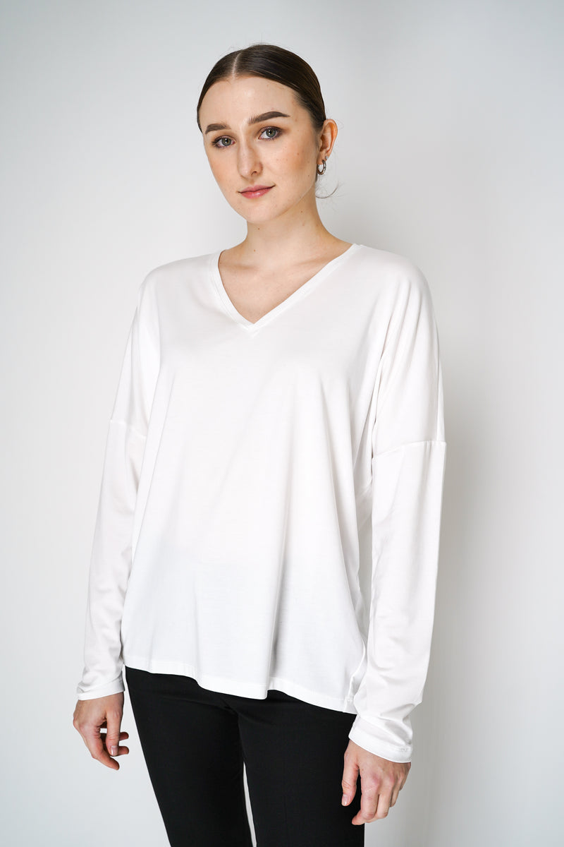 Peter O. Mahler Long Sleeve V-Neck Jersey Pullover Top in White Vancouver. Shop Online or in Store.