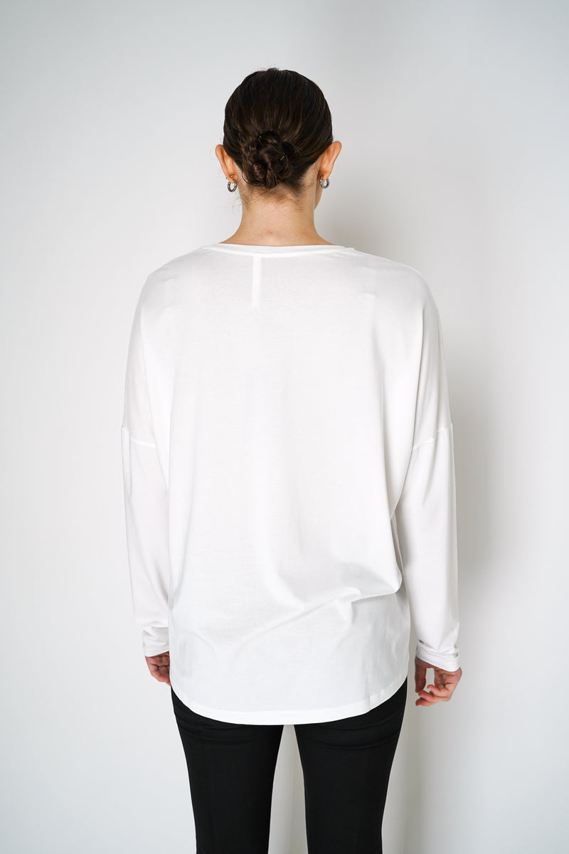 Peter O. Mahler Long Sleeve V-Neck Jersey Pullover Top in White Vancouver. Shop Online or in Store.