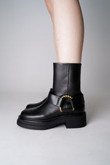 Dorothee Schumacher Short Biker Boots with Twisted D-ring Detail in Black Vancouver. Shop Online or in Store.