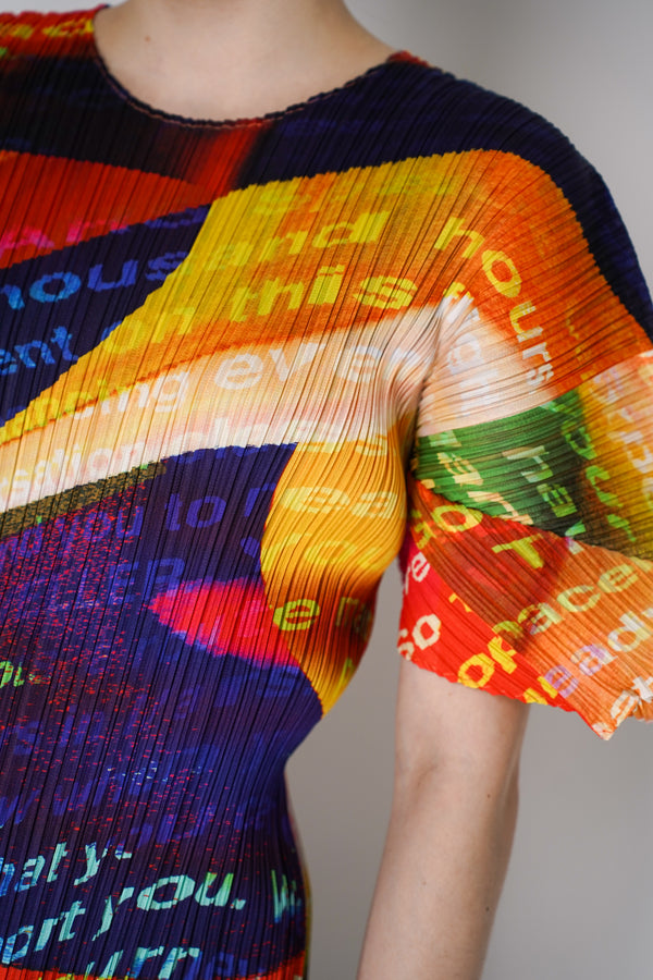 Pleats Please Issey Miyake Voyager Top with Balloon Sleeves in Multicolour Print Vancouver. Shop Online or in Store. 