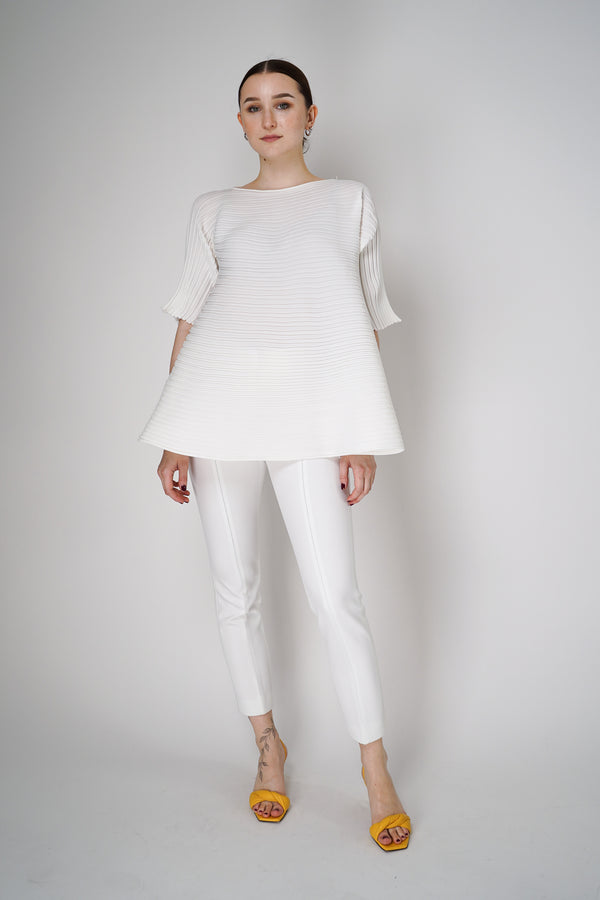 Pleats Please Issey Miyake Bounce Knit Short Sleeve Flared Top in White Vancouver. Shop Online or in Store. 