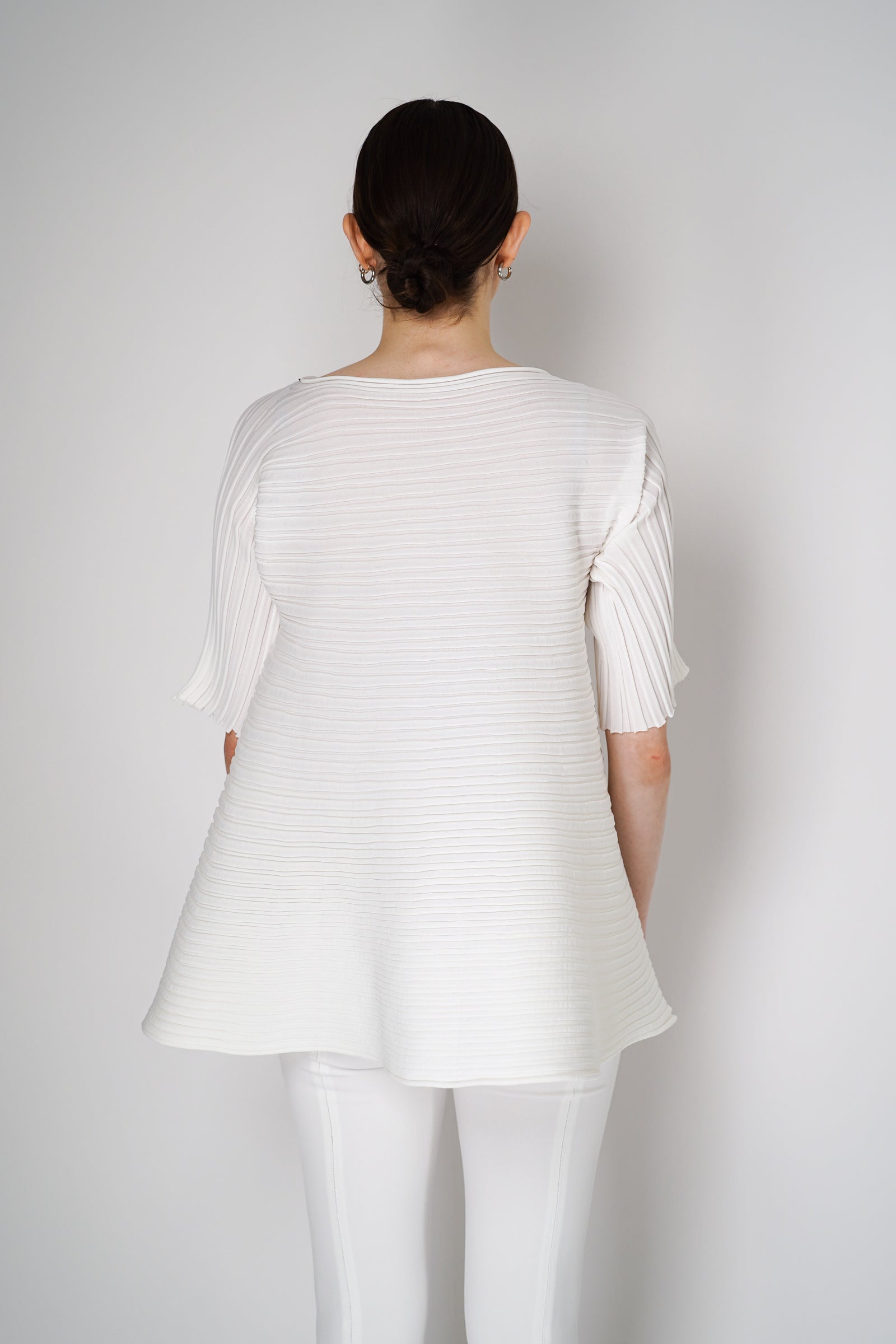 Pleats Please Issey Miyake Bounce Knit Short Sleeve Flared Top in Whit –  Ashia Mode