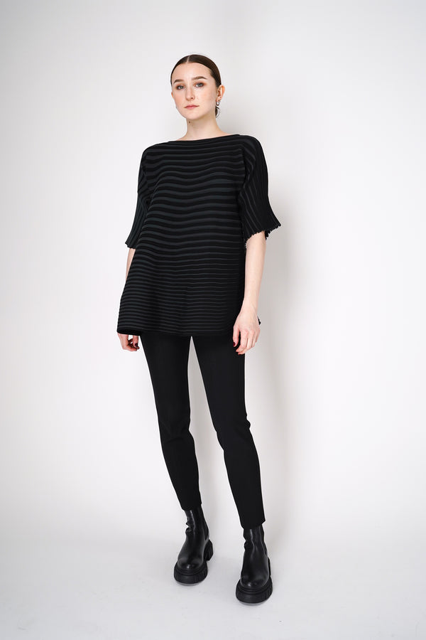 Pleats Please Issey Miyake Bounce Knit Short Sleeve Flared Top in Black Vancouver. Shop Online or in Store. 