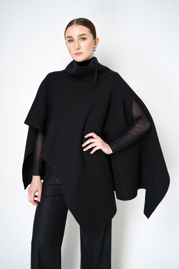 Annette Gortz Virgin Wool Asymmetrical Poncho in Black Vancouver. Shop Online or in Store. 