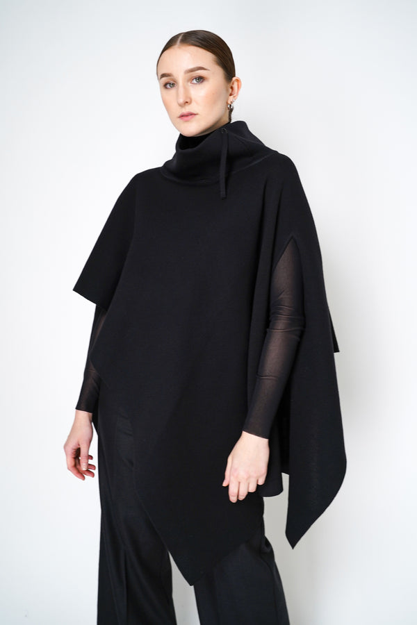 Annette Gortz Virgin Wool Asymmetrical Poncho in Black Vancouver. Shop Online or in Store. 