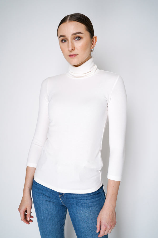 L'Agence Aja 3/4 Sleeve Turtleneck Knit Top in Off-White Vancouver. Shop Online or in Store. 