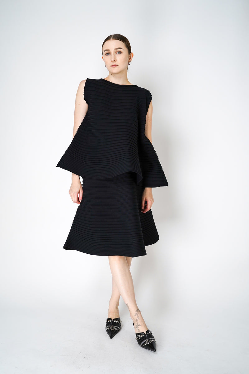 Pleats Please Issey Miyake Bounce Knit Flared Sleeveless Top in Black Vancouver. Shop Online or in Store. 