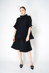 Pleats Please Issey Miyake Bounce Knit High Neck Flared Top in Black Vancouver. Shop Online or in Store. 