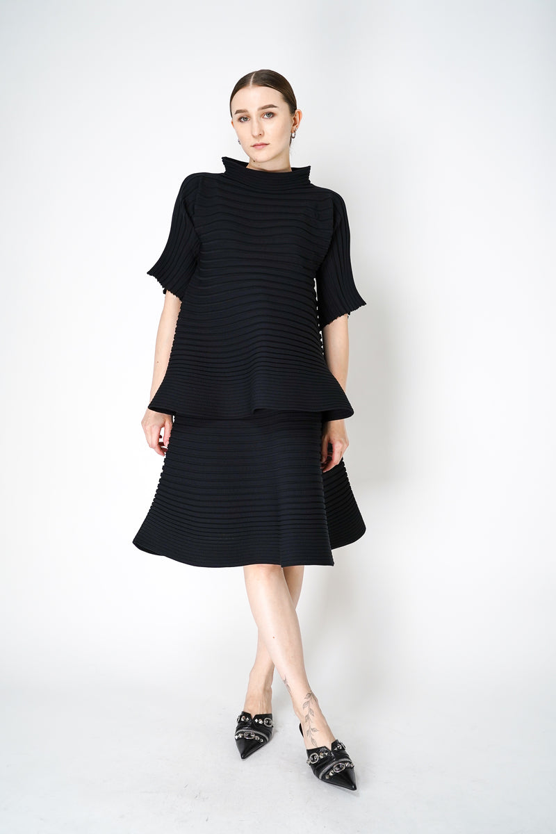 Pleats Please Issey Miyake Bounce Knit High Neck Flared Top in Black Vancouver. Shop Online or in Store. 