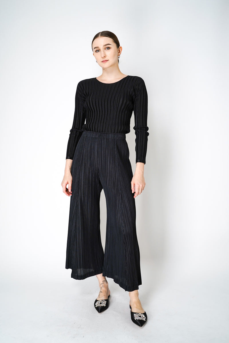 Pleats Please Issey Miyake Rib Pleats Basics Long Sleeve Top in Black Vancouver. Shop Online or in Store. 