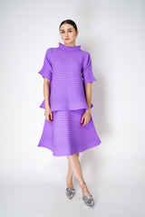 Pleats Please Issey Miyake Bounce Knit High Neck Flared Top in Lilac Vancouver. Shop Online or in Store. 