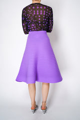 Pleats Please Issey Miyake Bounce Knit Flared Skirt in Lilac Vancouver. Shop Online or in Store. 