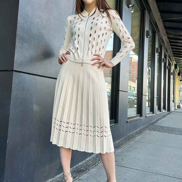 D. Exterior Pleated Knit Skirt with Cut Out Detail in Cream